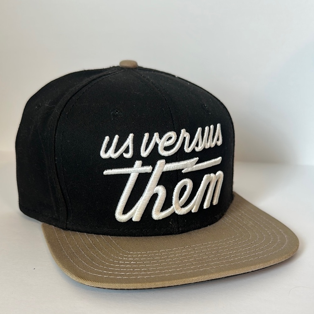 Us Versus Them Black and Tan Cap
